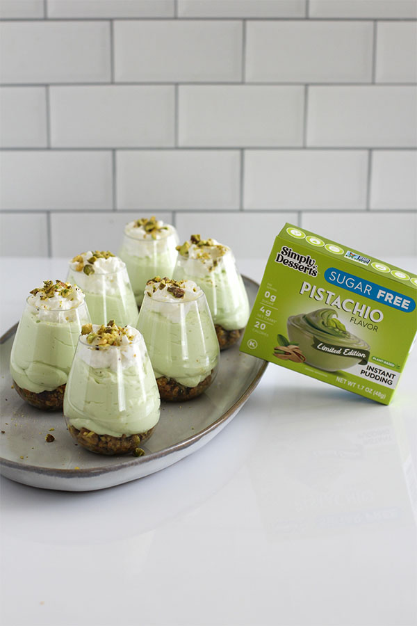 Pistachio cheesecake cups with Simply Desserts Pistachio Pudding box in the background