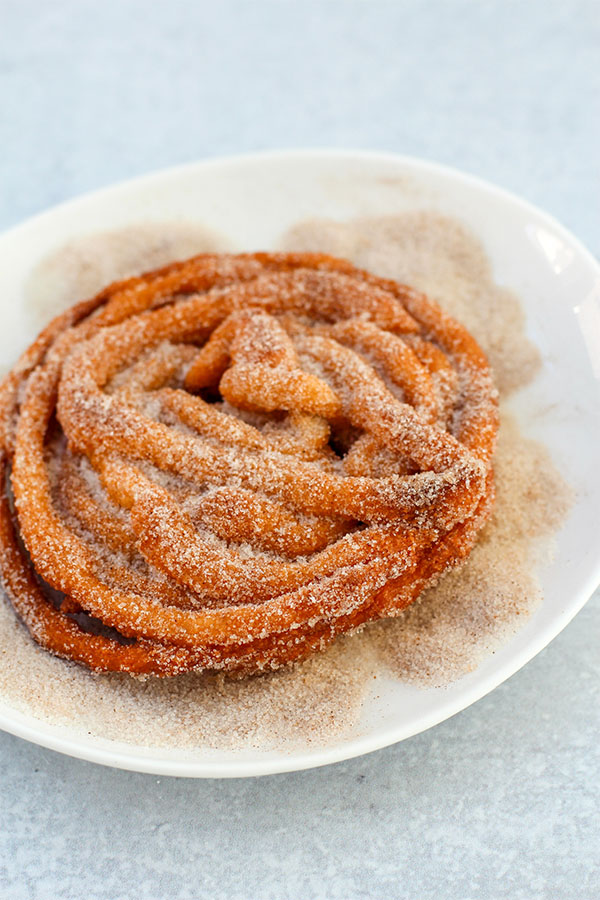 Freshly fried protein churros coated in cinnamon sugar