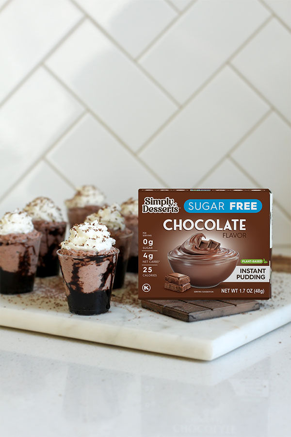 Chocolate pudding cups with Simply Desserts chocolate pudding box in foreground