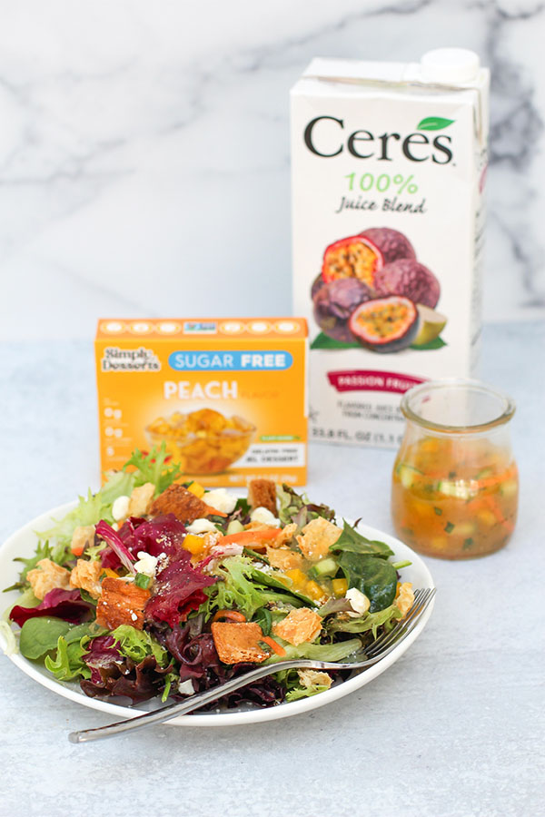 Hero shot with Ceres Juice + Simply Desserts Peach Jel pack + prepared salad