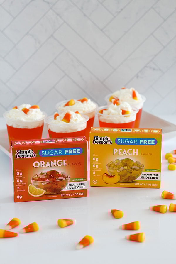 Row of Candy Corn Jel cups with Simply Desserts Peach and Orange Jel boxes in the background