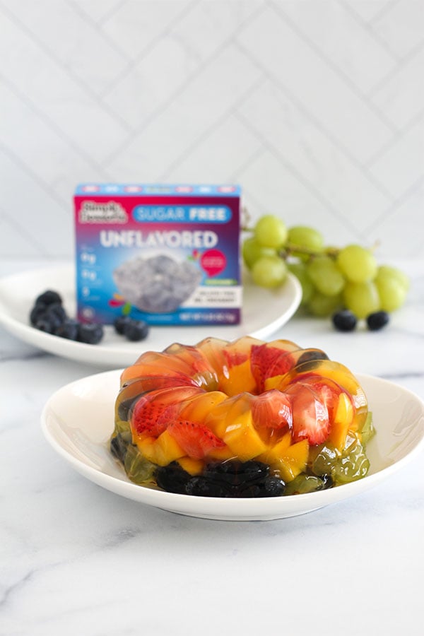 Close-up of Fruity Jel Cake with vibrant fruit layers and glossy jel texture.